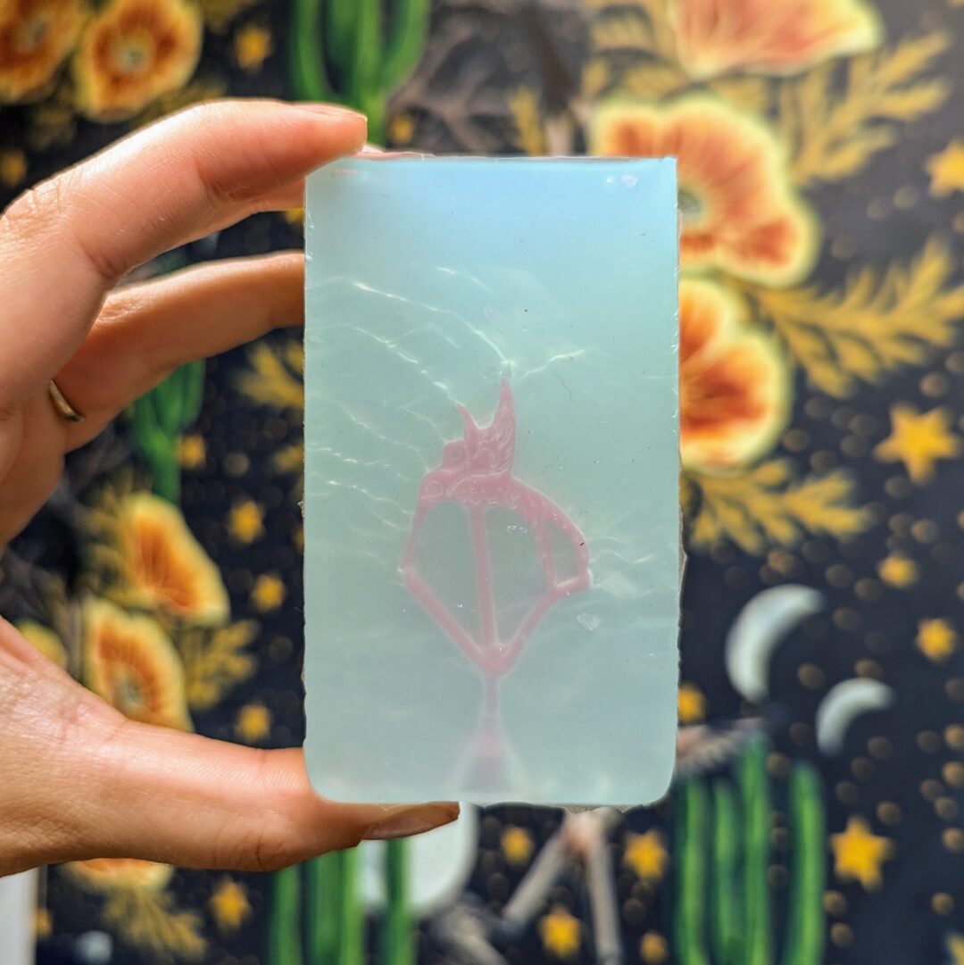 RTV silicone mold sample with pink wax injection of a hummingbird
