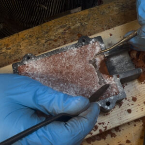 progress photo of a sand casting process