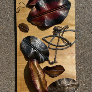 various samples of fold forming jewelry technique in leaf shape