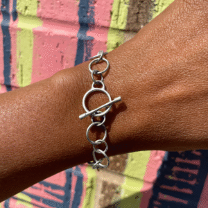hand-made chain bracelet on a wrist. this is a sample project for the chain making class